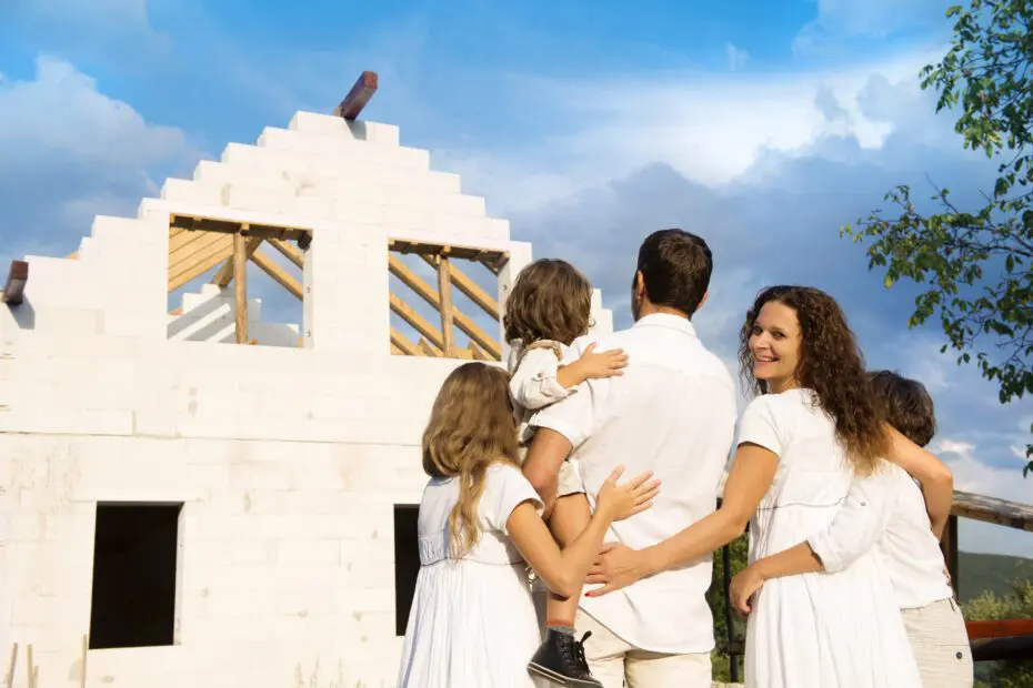 happy and big family builds a new house for living SBI 304924049
